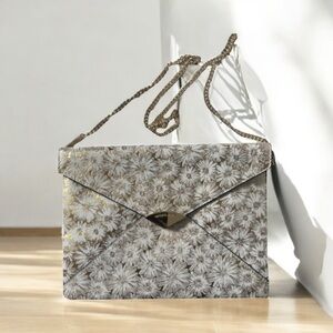 Michael Kors Silver & White Floral Barbara Clutch with Silver Chain